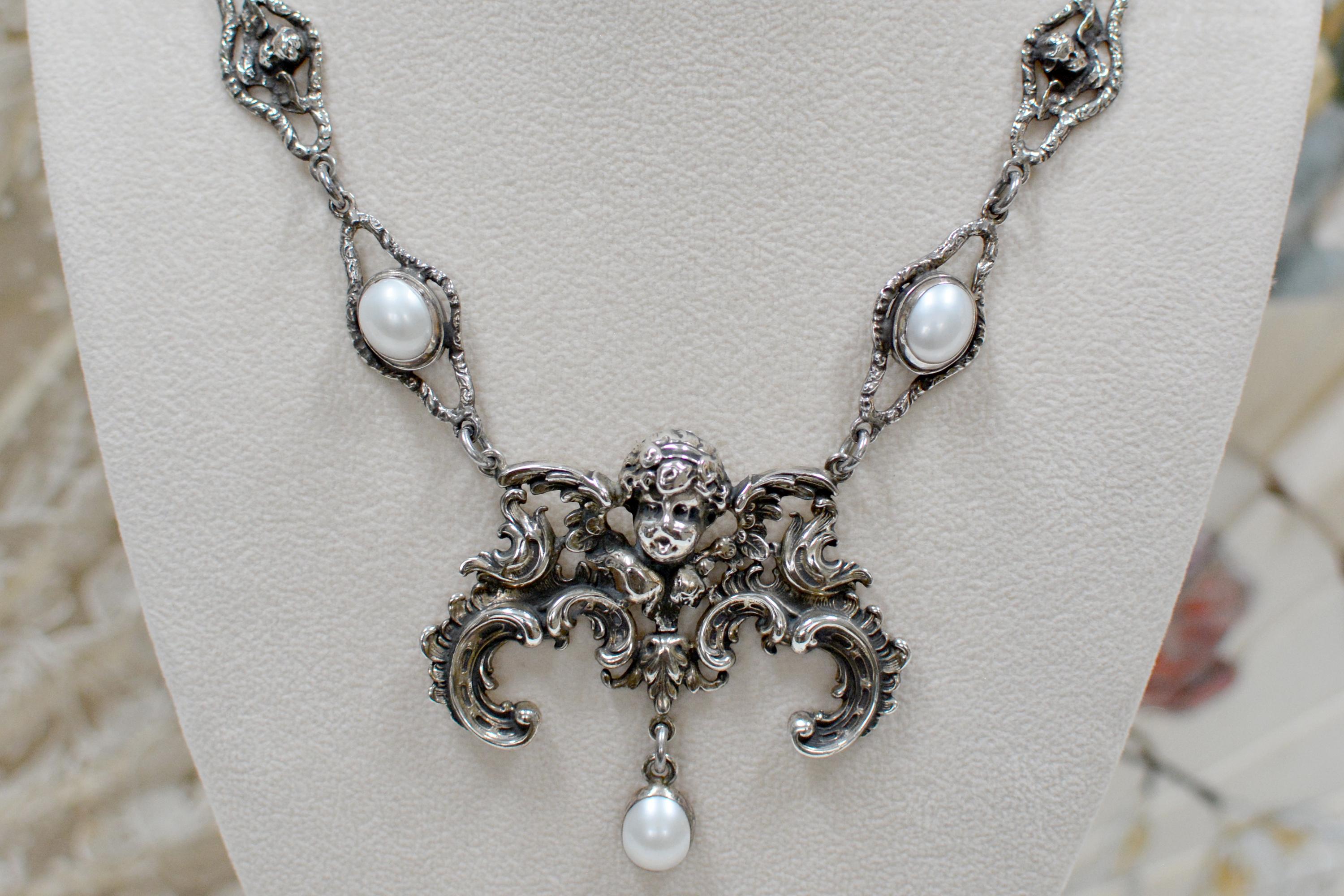 Oval Cut Jill Garber Necklace with Baroque Angel and Freshwater Pearls