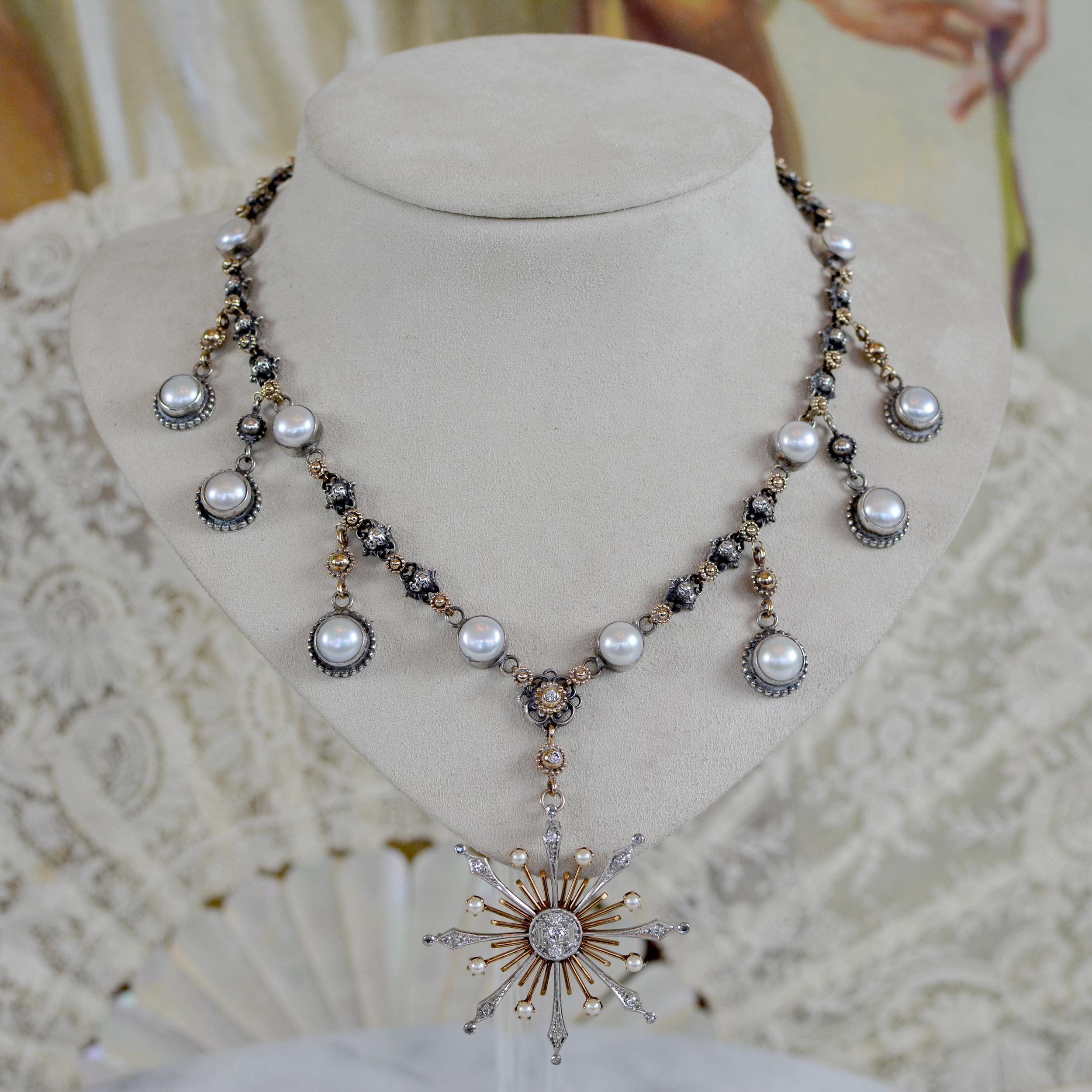 This exquisite Jill Garber drop necklace is comprised of twenty eight very fine original figural cherub angel links, joined together by finely cast 14 karat gold flower links. Eight natural freshwater pearls are bezel set in sterling silver and