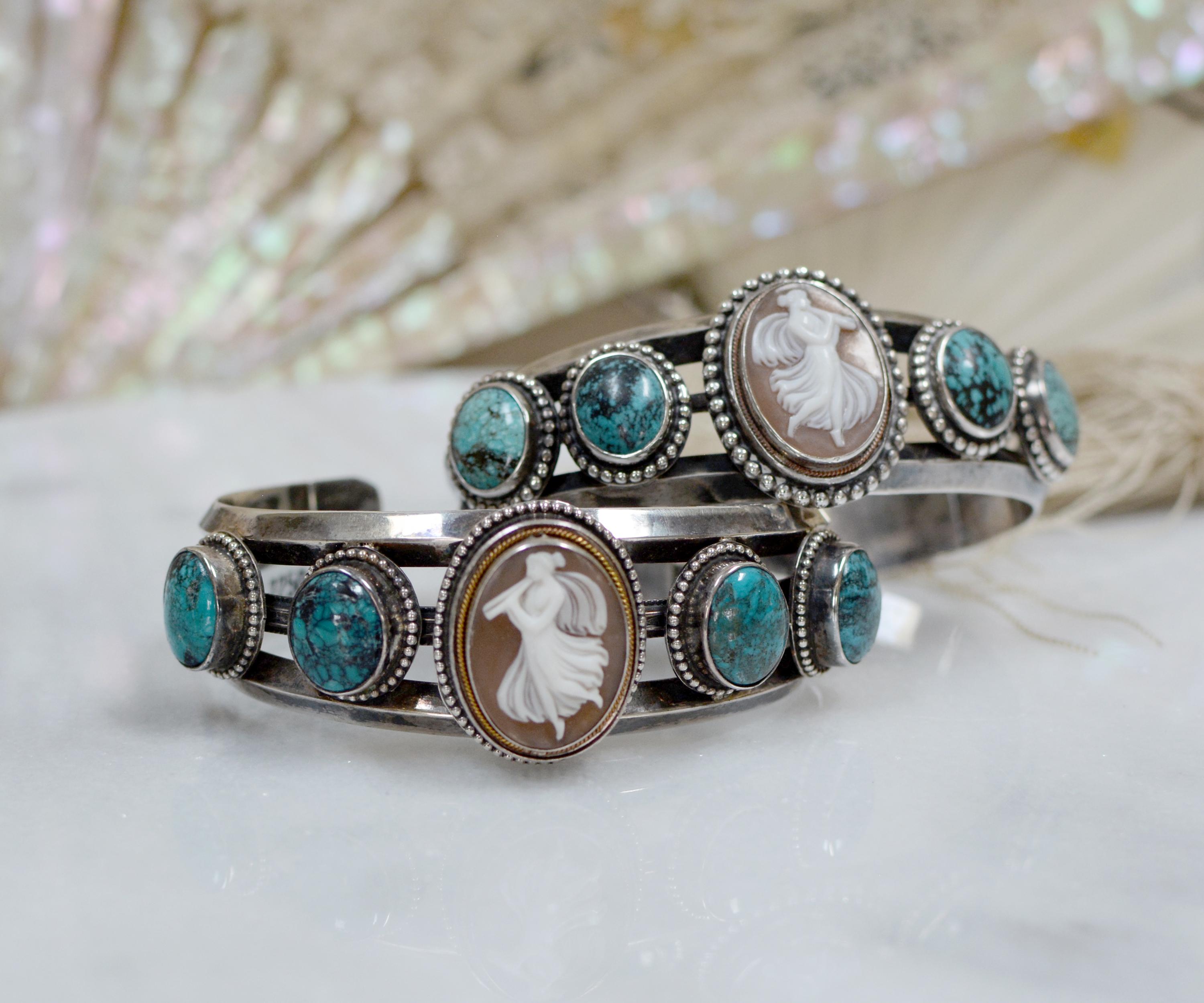 Jill Garber creates a limited number of bracelets in pairs and this is one of her most handsome sets. At the center of each of two cuffs is a hand carved antique  cameo featuring an ethereal Goddess playing a flute. Each of the two Goddess' faces a