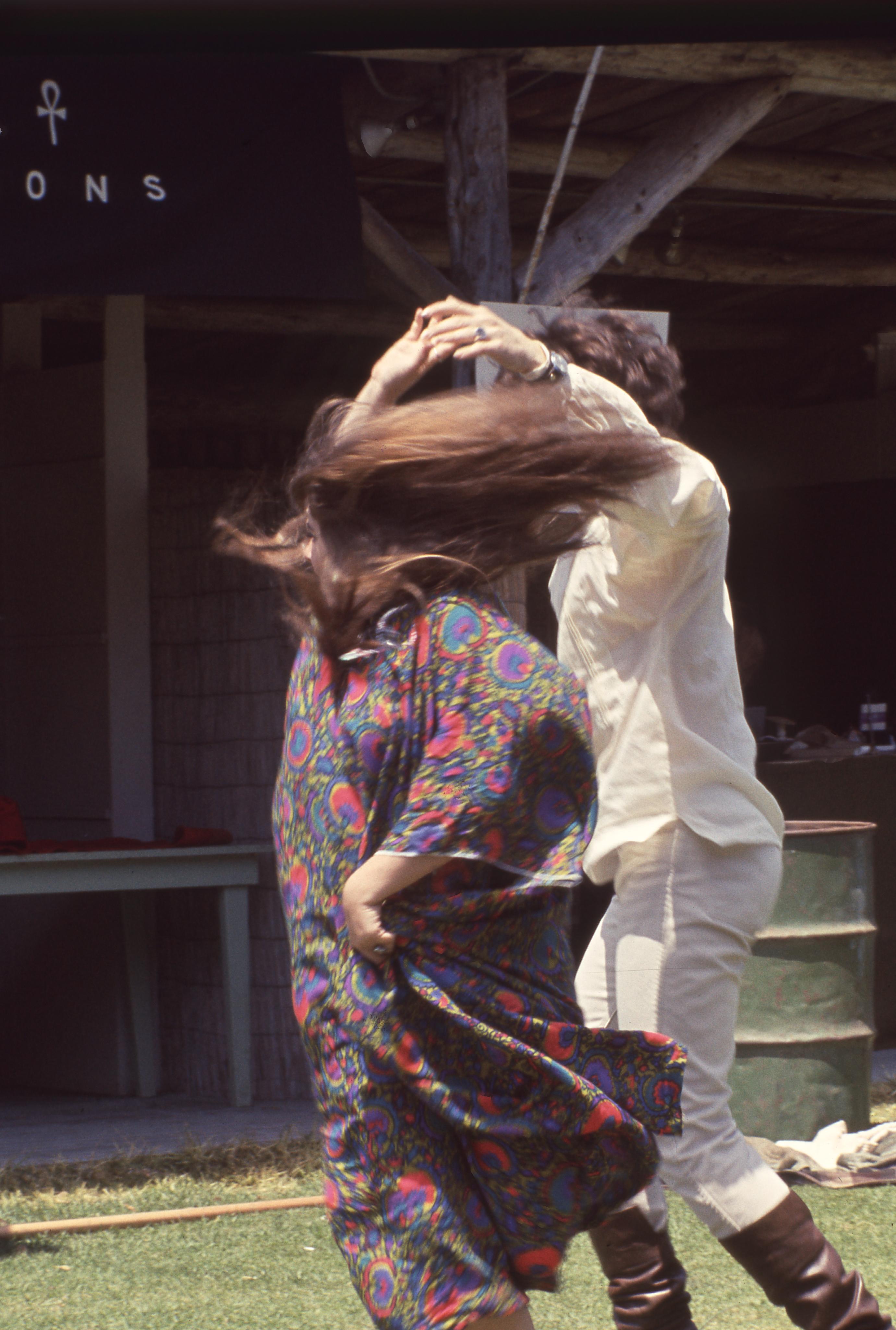 Jill Gibson Color Photograph - Mama Cass Spinning at Monterey Pop Festival Fine Art Print