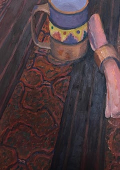Ceramic Mug and Rolled Cloth Resting on a Dark Wooden Table with Ornate Rug
