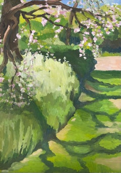 Sunlit Garden Path with Blooming Cherry Blossoms Vibrant Green Foliage