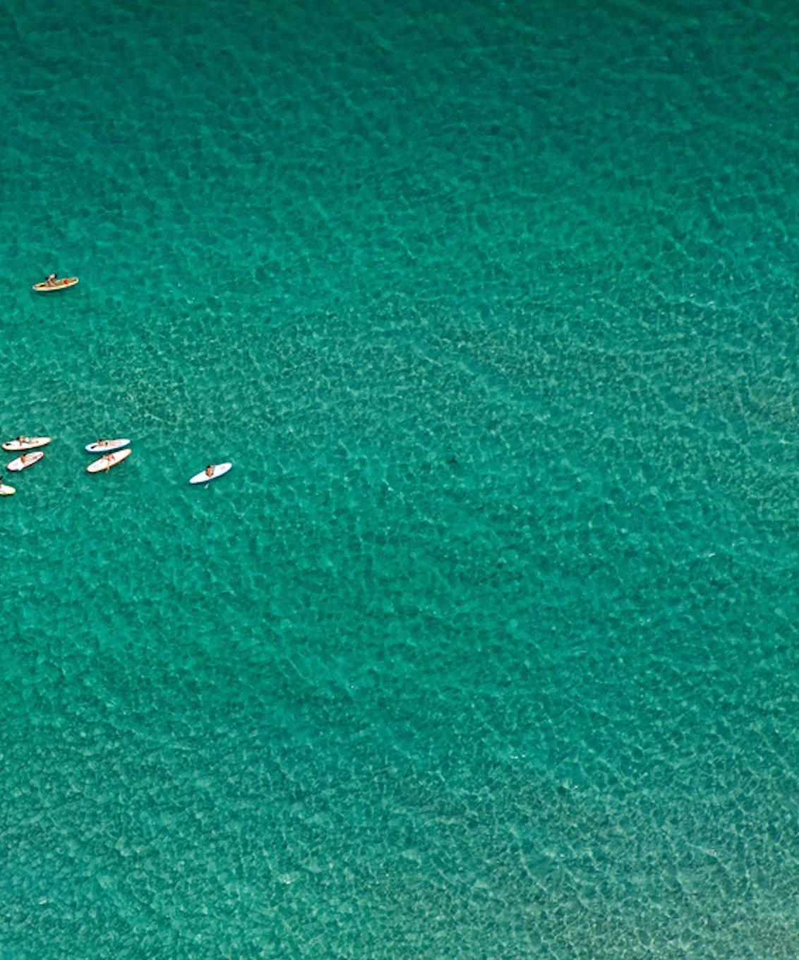 Paddle Boarders. Areal Landscape ocean limited edition color photograph - Abstract Photograph by Jill Peters