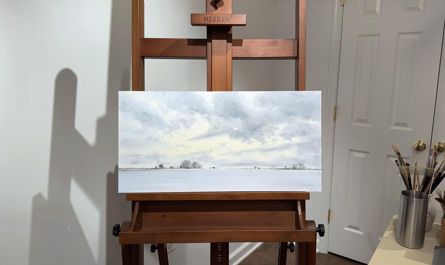 <p>Artist Comments<br />The painting highlights the beautiful blue-violet tones often seen in snowy landscapes. Subtle pale gold on the horizon complements and adds warmth to the coolness of the scene. A low horizon line, combined with strong value