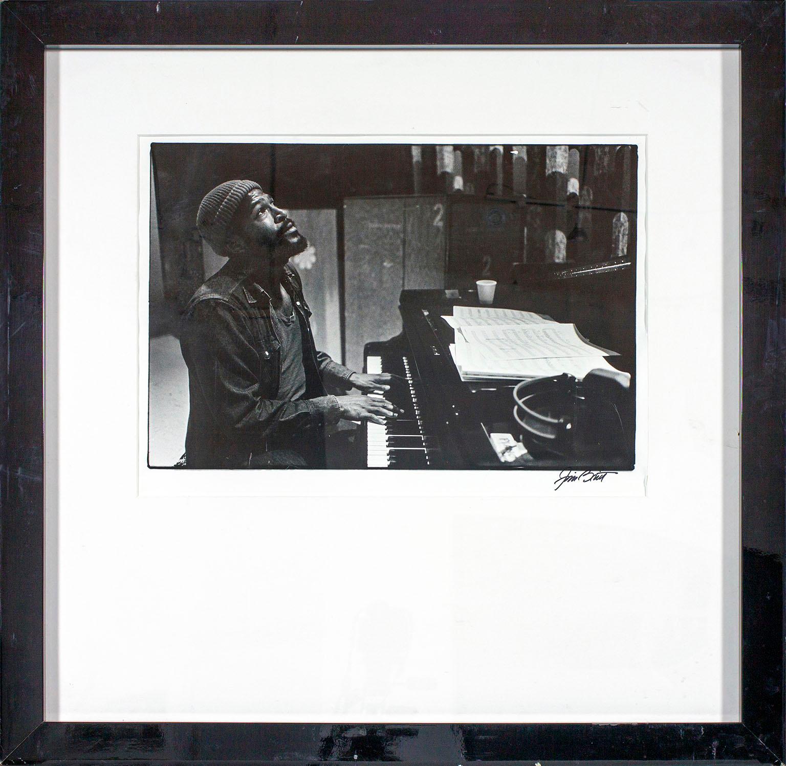 "Marvin Gaye at the Recording Session for 'Let's Get It On'" black and white framed photograph hand signed by Jim Britt. This image is in the collection of the Smithsonian Portrait Gallery in Washington, D.C. The photograph offered here was