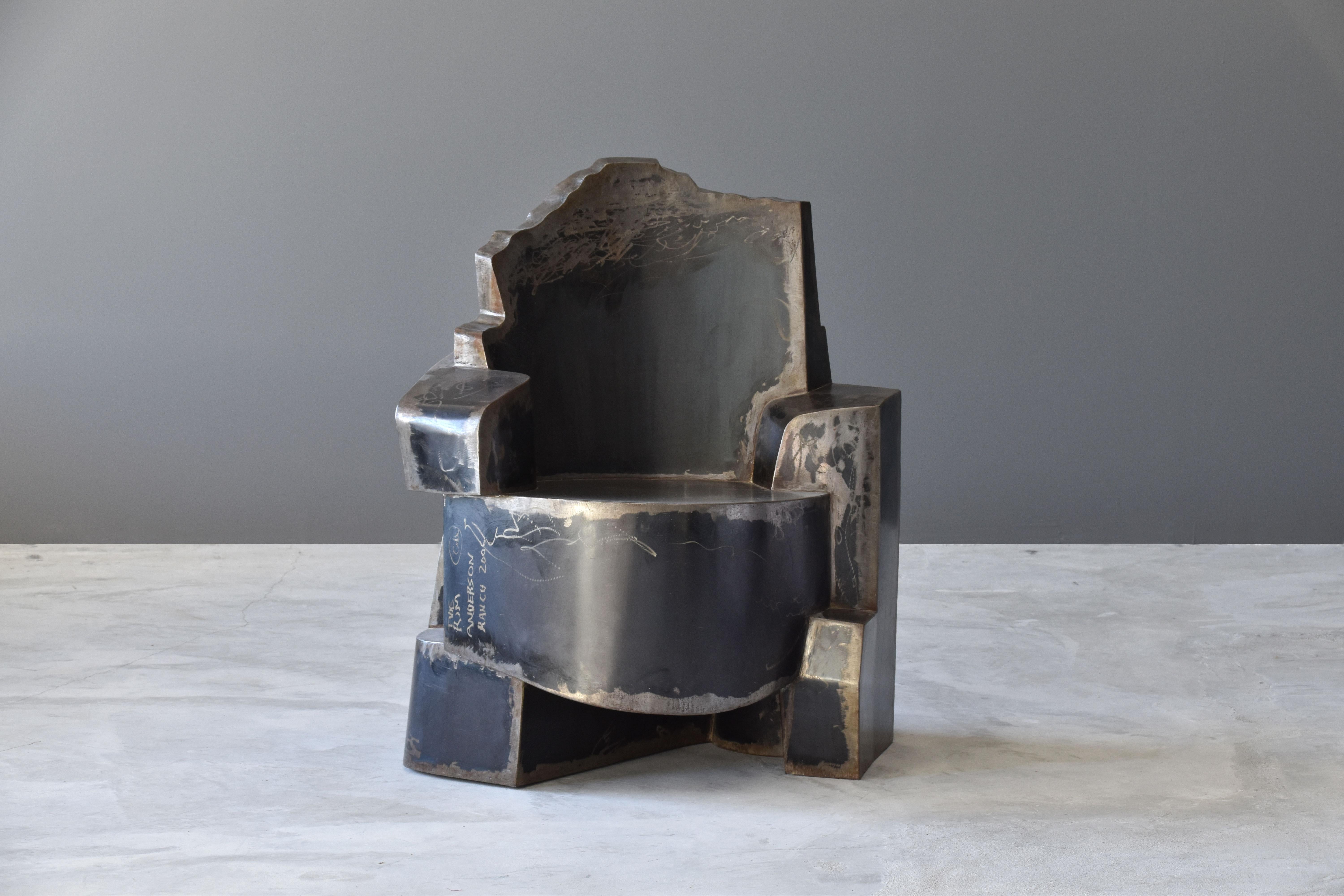 A contemporary welded metal armchair by American designer, Jim Cole. Titled 