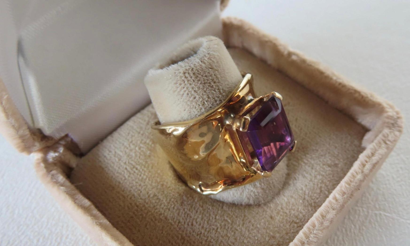 Jim Cotter 14K Gold Wide Band With Emerald-cut Amethyst Ring. 9 grams total weight. Very good condition.