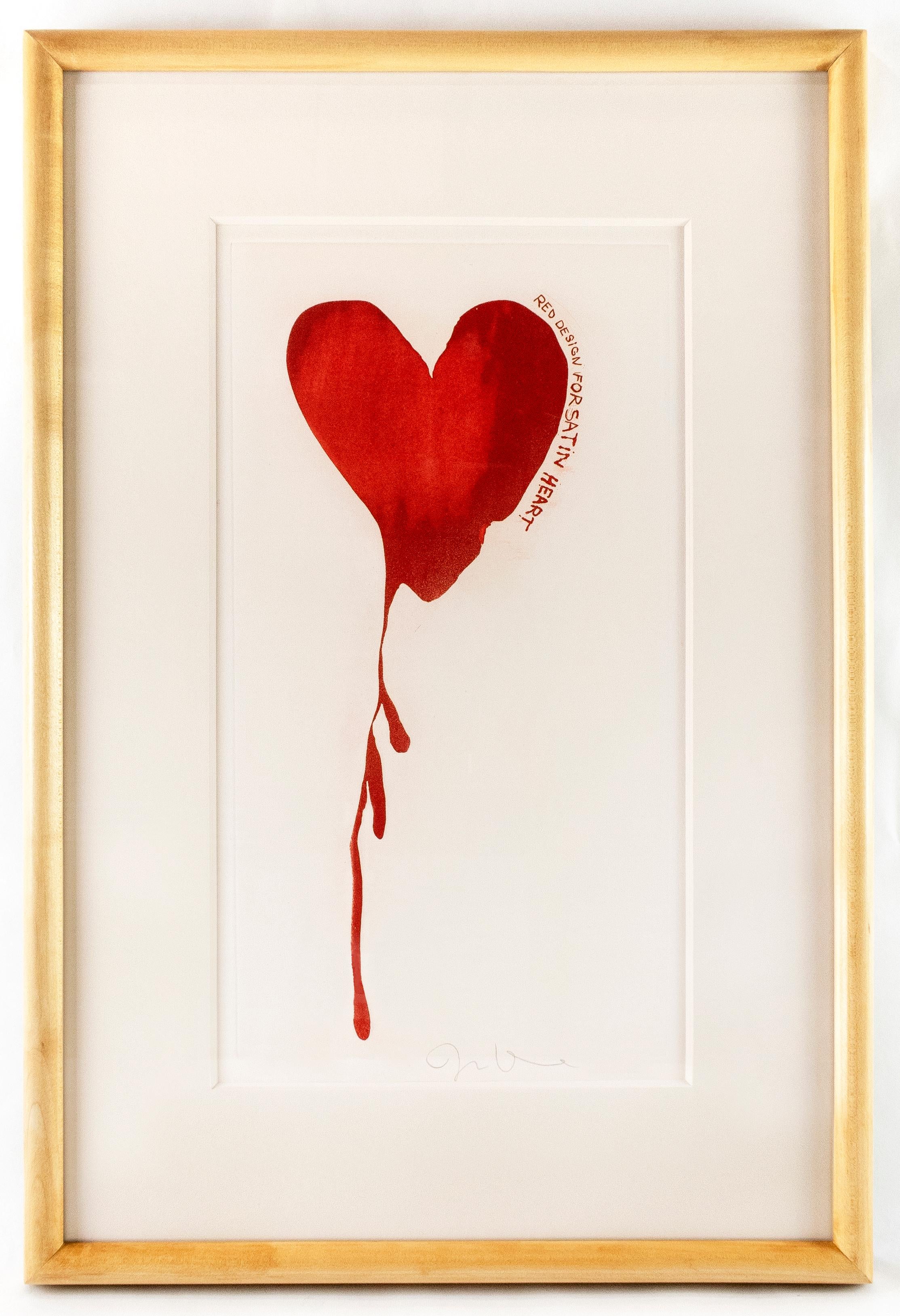 This print depicts one of Jim Dine's signature subjects, a deep red heart dripping down the page, appearing as a bleeding heart. Along the right side of the heart, hand-drawn text reads: “Red design for satin heart”. Dine was working on the sets and