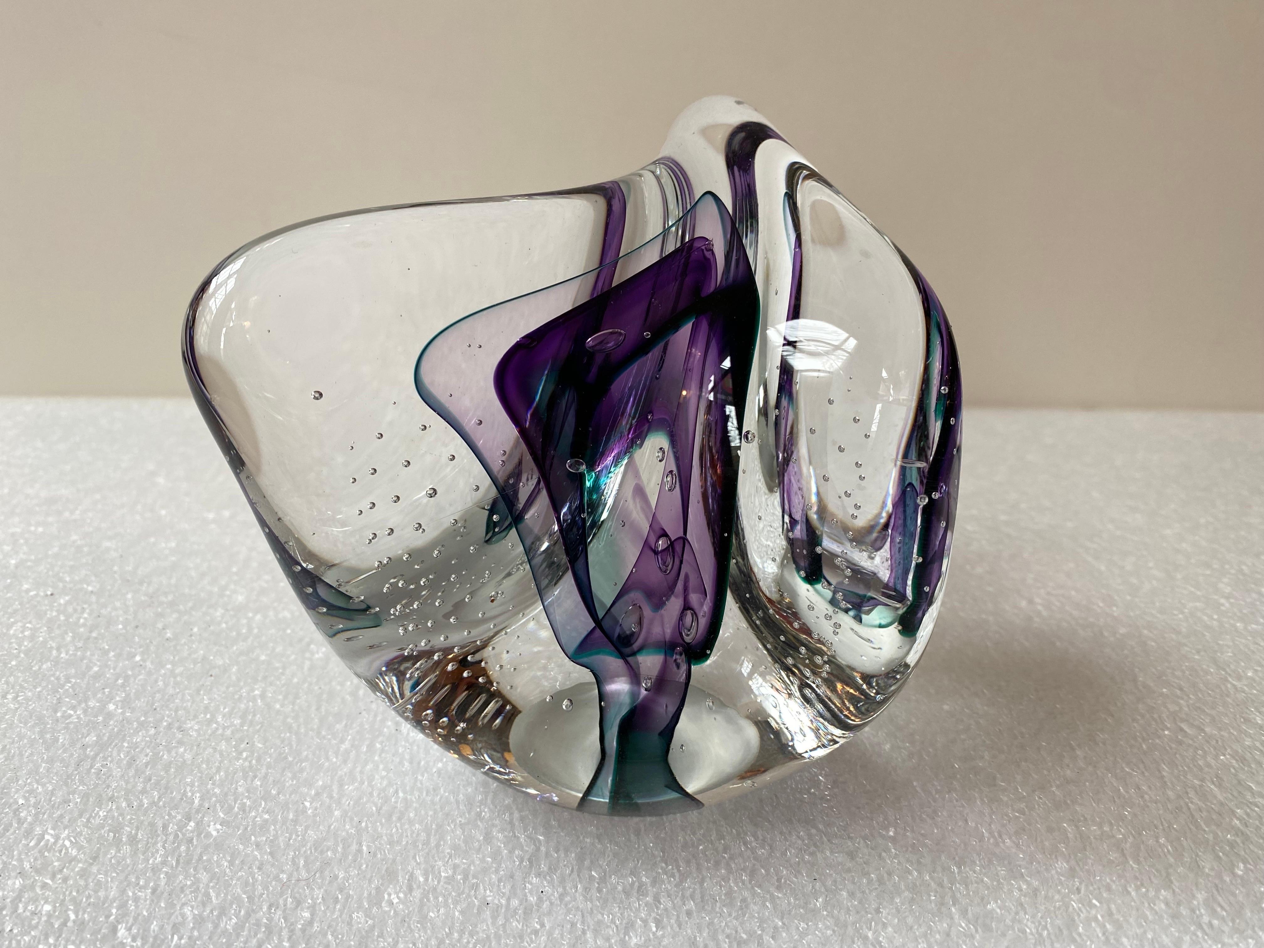 Jim Karg Art glass sculpture. Somewhat triangular shape with purple internal color. Signed bottom side.