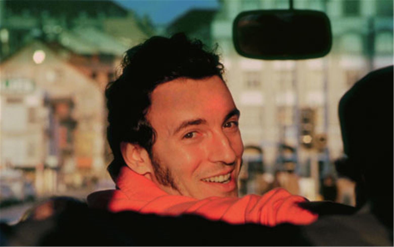 Jim Marchese Color Photograph - Bruce Springsteen, Golden Bus, Zurich, April 1981