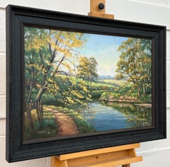 Un lussureggiante sentiero alberato sul fiume Lagan, nell'Irlanda del Nord, realizzato da un artista irlandese