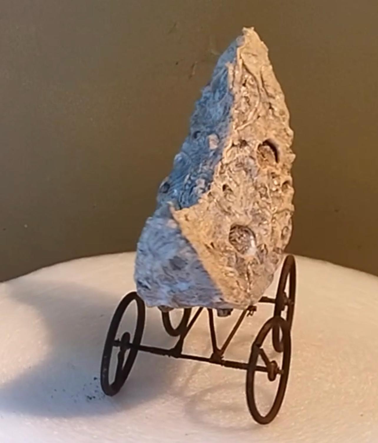 Artist: Jim Pallas (1941)
Title: Grey Moon on One Spoke Wheels
Year: 2009
Medium: Ceramic and steel
Size: 8.5 x 8 x 4 inches
Condition: Excellent
Inscription: Signed and dated.

JIM PALLAS (1941-) American painter, draughtsman, sculptor, and