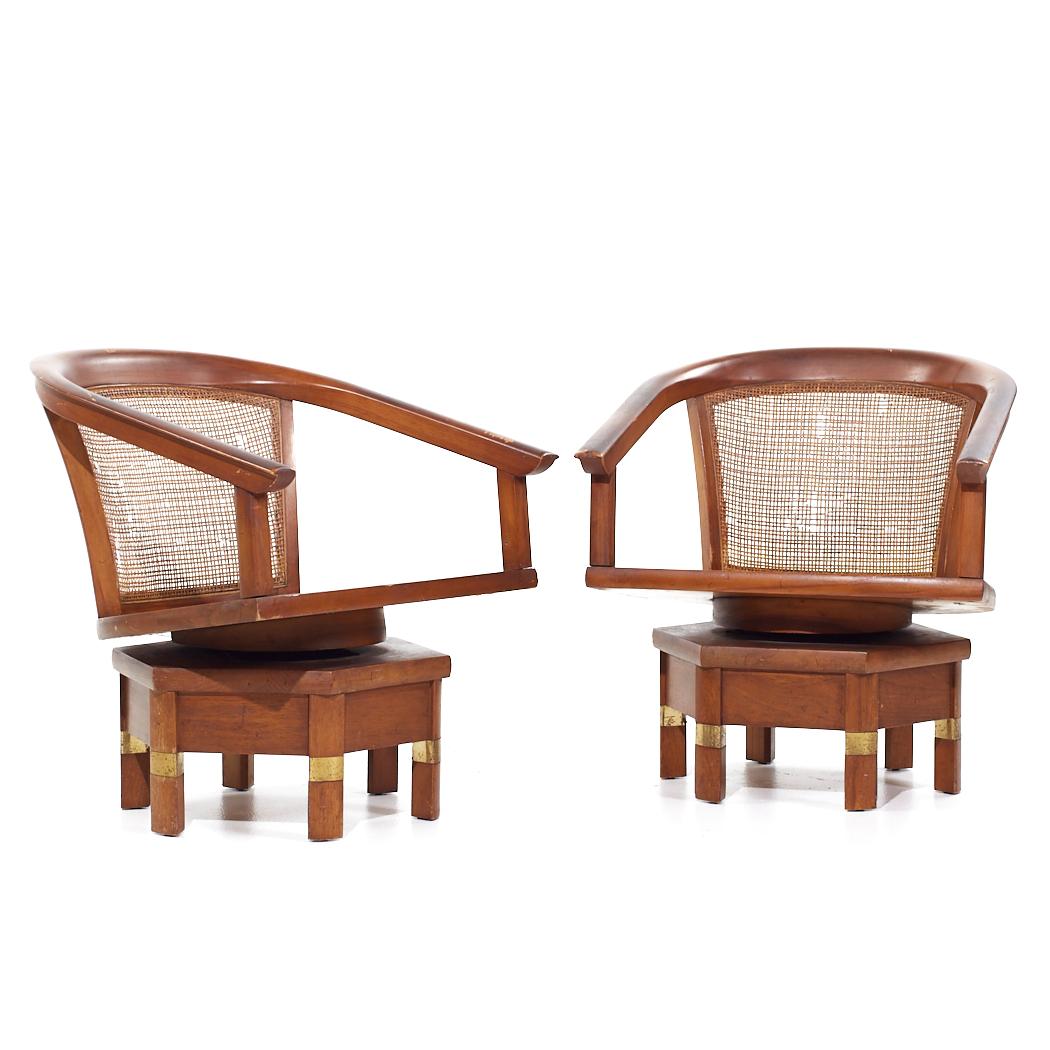 Jim Peed for Hickory Model 5105 Mid Century Mahogany Swivel Chairs - Pair

Each swivel chair measures: 23.25 wide x 25 deep x 26 high, with a seat height of 13.5 and arm height/chair clearance 20 inches

All pieces of furniture can be had in what we