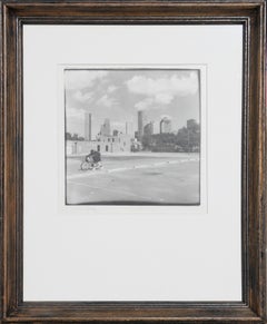 Black & White Urban Photograph of a Man with a Bike Against Houston, TX Skyline