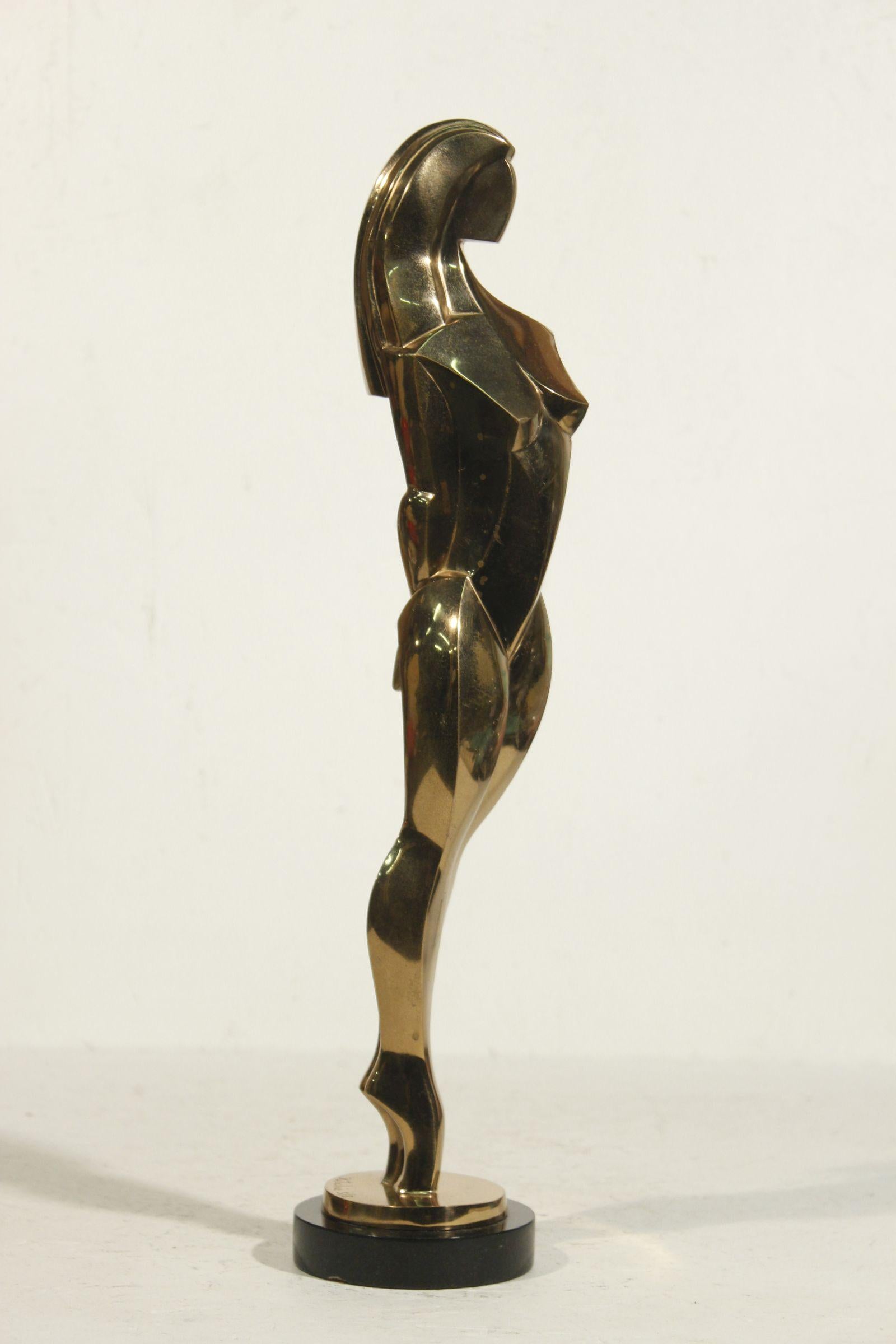 Gilt bronze sculpture of a standing woman in the figurative cubist style by Jim Ritchie circa 1990 in Vence, France, edition 5 of 8. 

In great structural condition, has no damage, however the gilt shows signs of aging in some places. 


