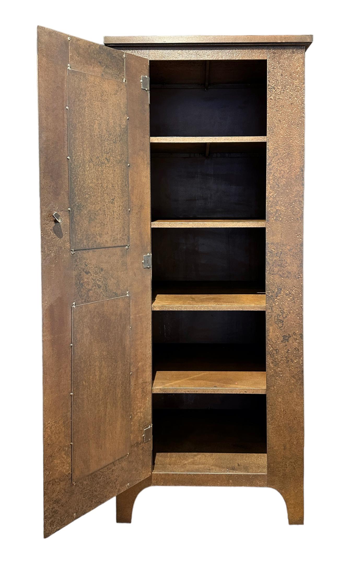 This Shaker inspired one-door armoire is made of fully repurposed steel.  This modern take on an old tradition uses naturally rusted steel to bring a warmth to this beautifully constructed armoire.   Four fixed shelves inside makes this a highly