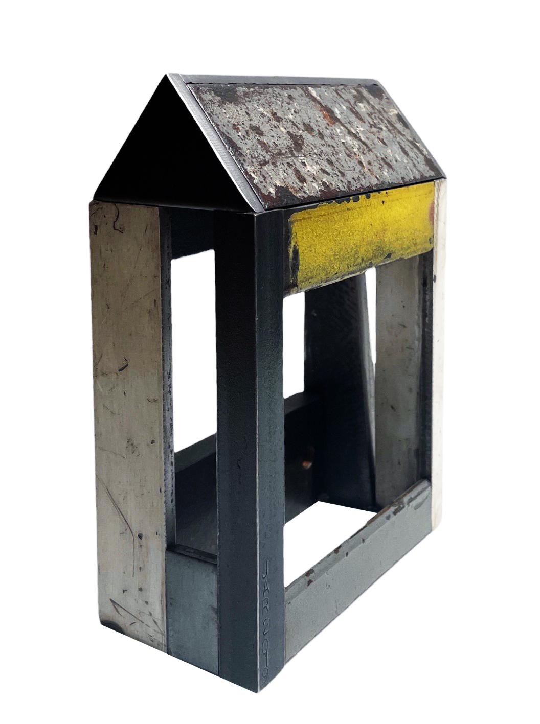 This is a welded steel sculpture made by furniture creator Jim Rose. It is sustainable design created from salvaged and recycled steel panels left over from his larger projects. These sculptures reference traditional American Folk Art barn house