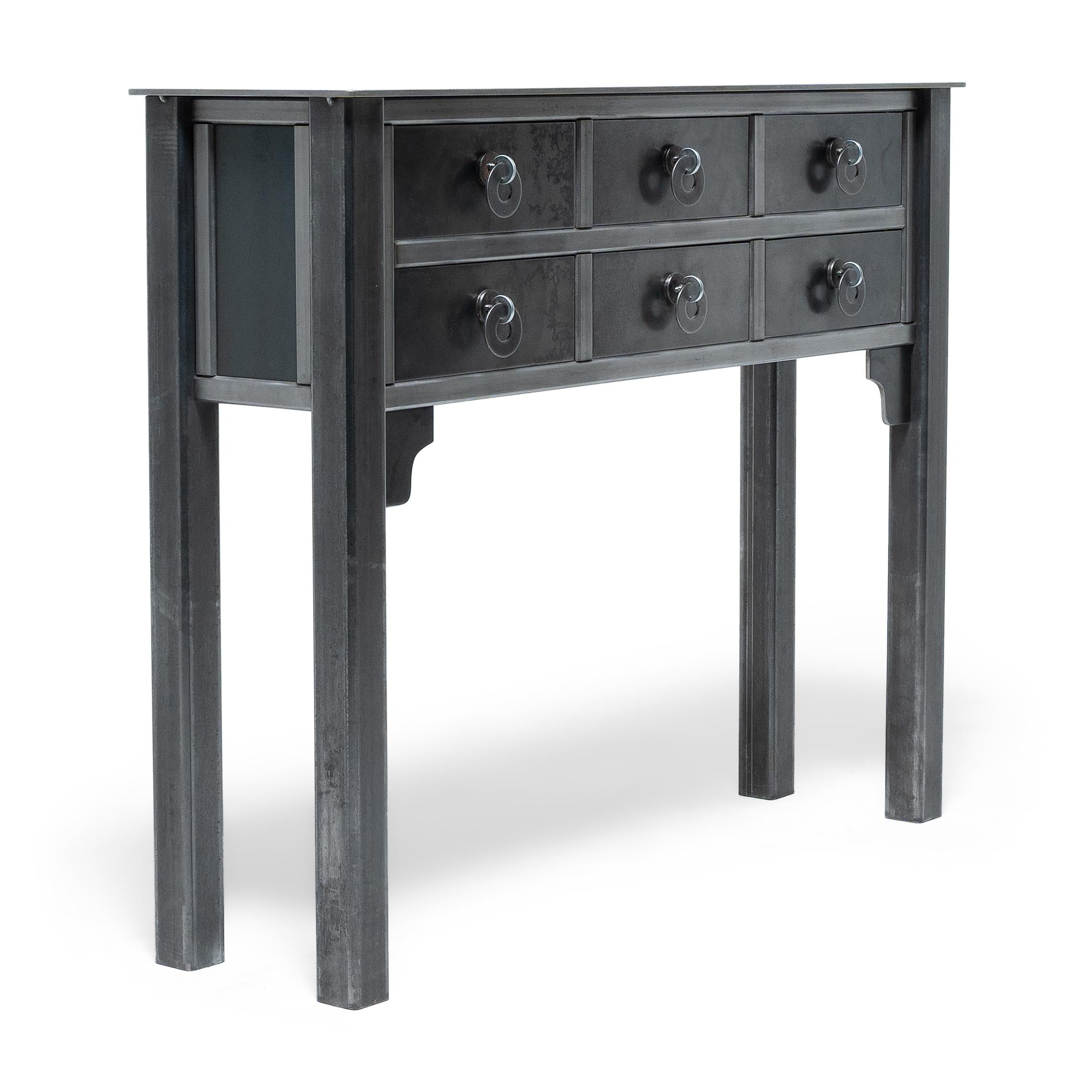 Created exclusively for Pagoda Red, the Ming Steel Collection by artist Jim Rose forges a connection between Shaker minimalism and the simplified lines of Ming-dynasty furniture. The culmination of years of studying the vernacular history of