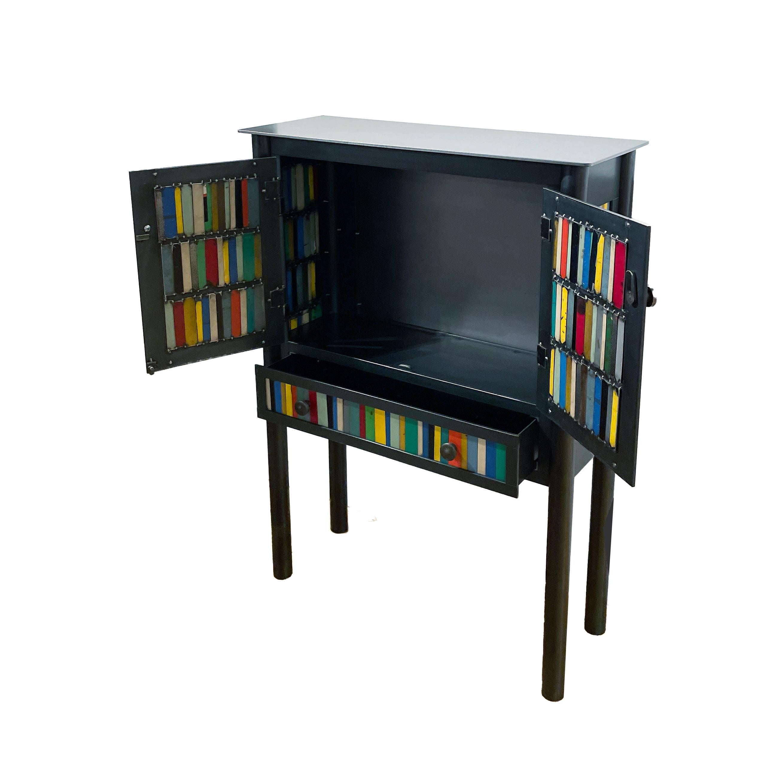 Contemporary Jim Rose Steel Furniture, Multi-Colored Narrow Two Door Cabinet with Drawer