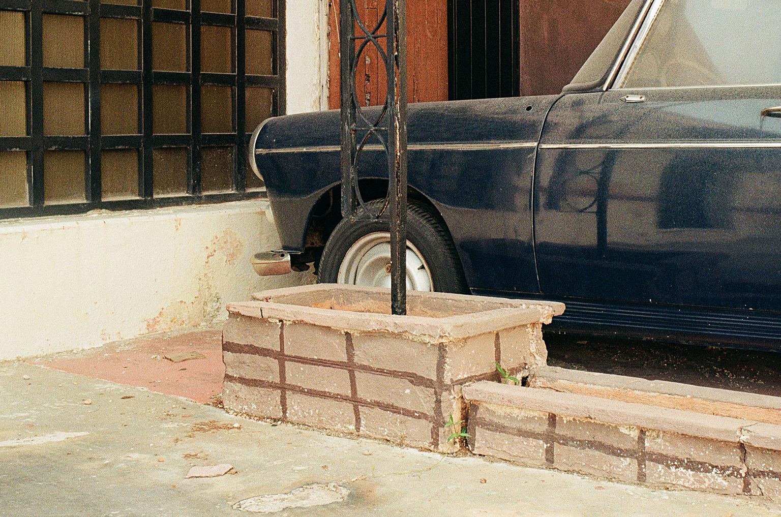 Peugeot, Merida, Mexico, - Photograph by Jim Ryce