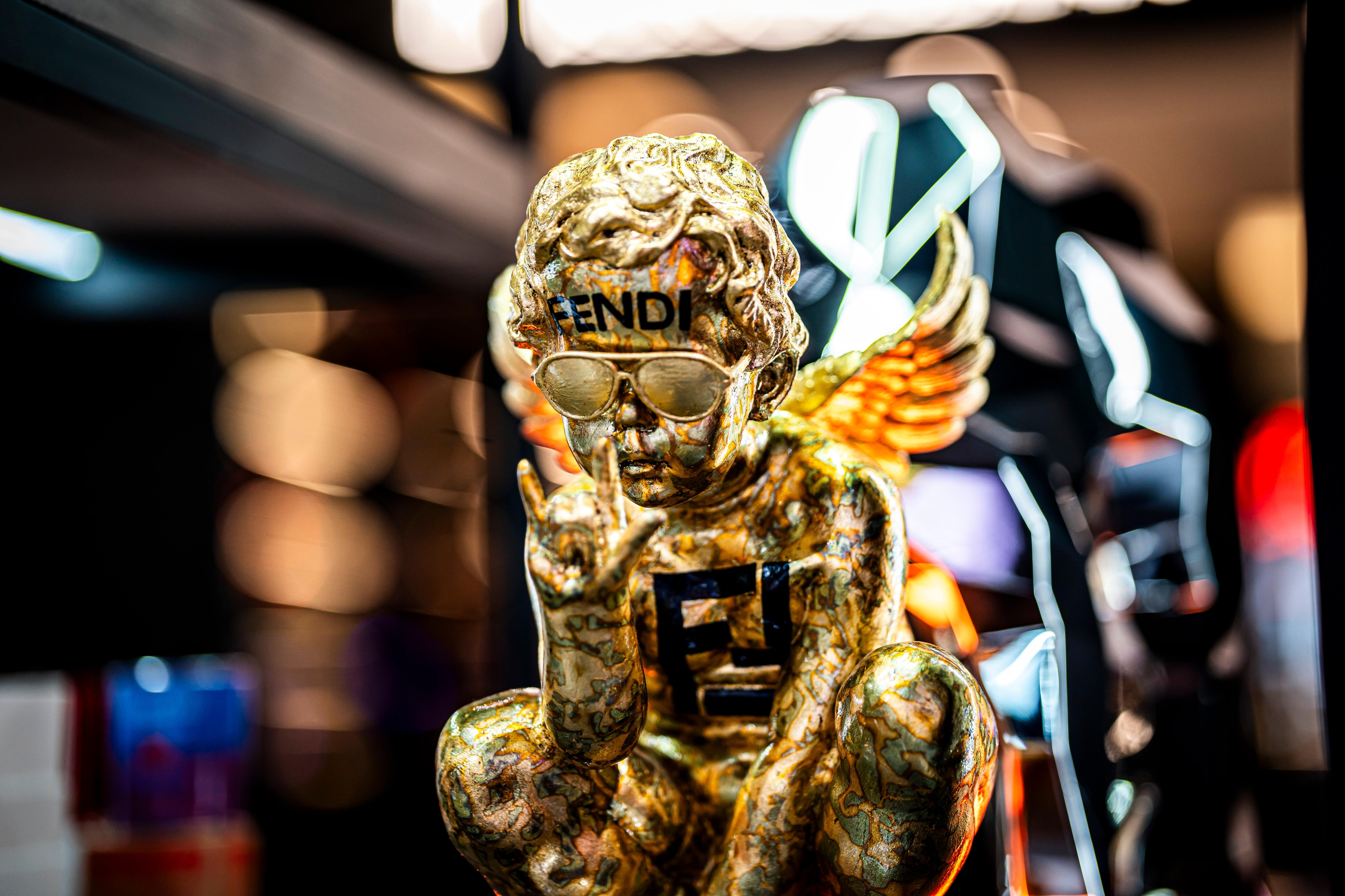 Gold Angel - Gucci Tribute - Sculpture by jimmie martin