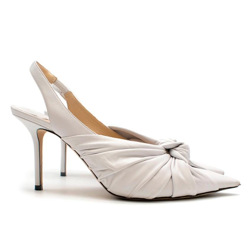 Jimmy Choo Annabell 85 white leather slingback pumps. Features a pointed-toe, knotted front and a stiletto heel. 


- Made in Italy 
- Upper: leather
- Lining: leather
- Sole: leather insole and sole
- Pointed toe
- Elasticated strap
- Made in