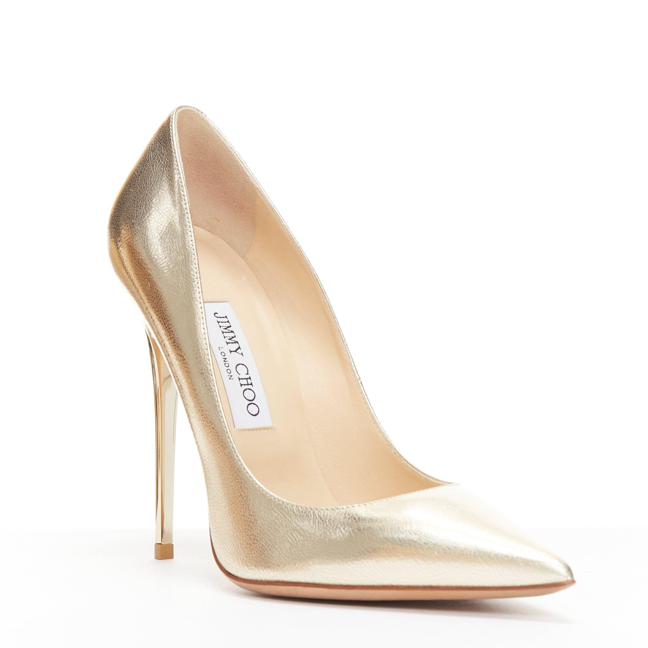 JIMMY CHOO Anouk gold metallic leather classic pointy toe stiletto pumps EU39
Reference: AAWC/A01168
Brand: Jimmy Choo
Model: Anouk
Material: Leather
Color: Gold
Pattern: Solid
Closure: Slip On
Lining: Nude Leather
Extra Details: Stiletto