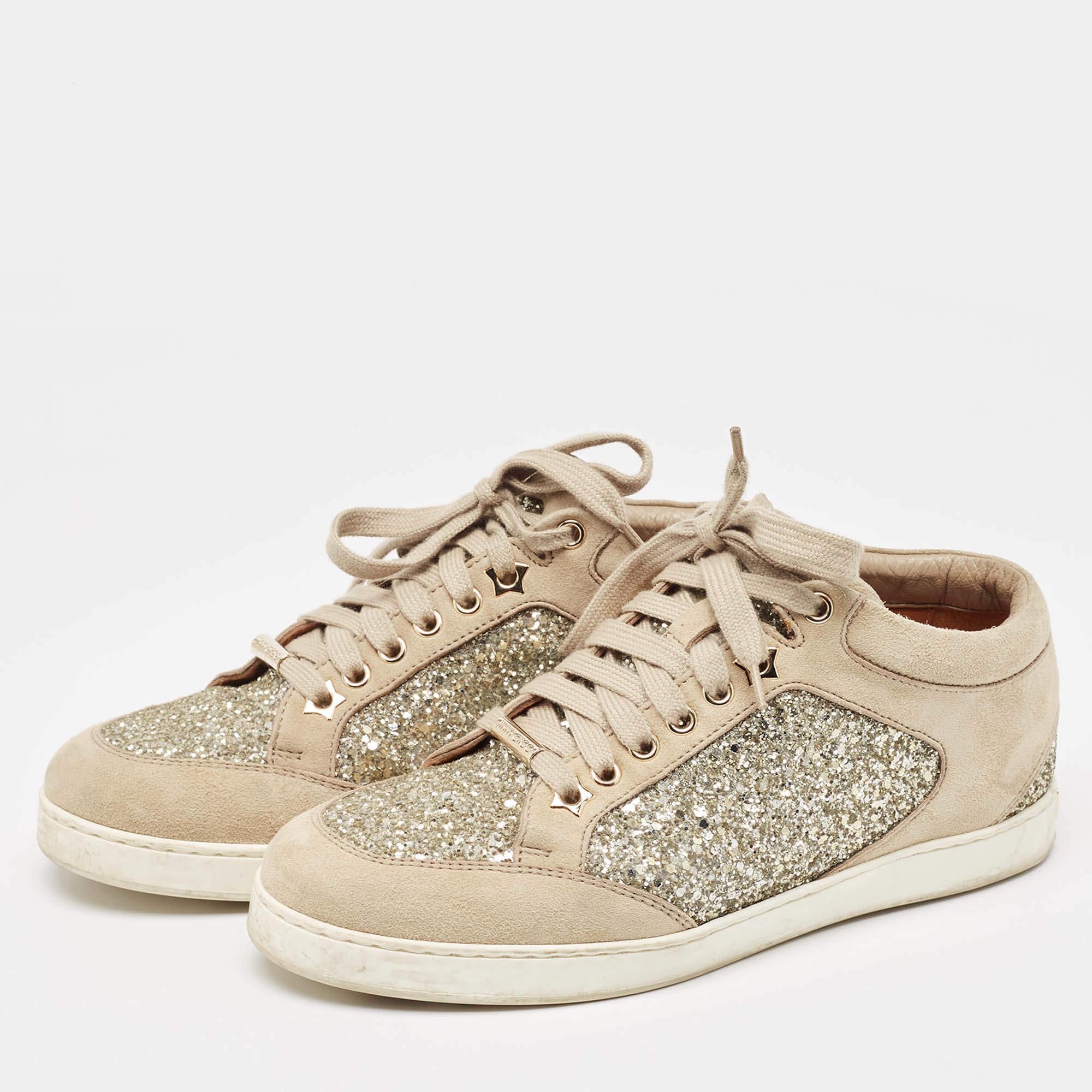 Who says sneakers cannot have a touch of glamour? These Jimmy Choo Miami sneakers are brilliantly crafted from suede and detailed with lace ups and glitter. They are set on comfortable rubber soles and make a great pair to dresses and skirts alike.