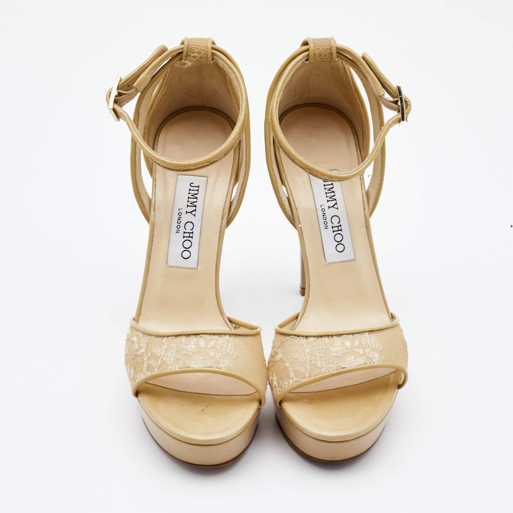 All a woman needs is a little love and a pair of Jimmy Choo sandals to brighten up her day. Elegant beige in color, these Kayden sandals have been crafted from lace and styled with open toes, closed backs with ankle wraps, and 11cm heels. They'll
