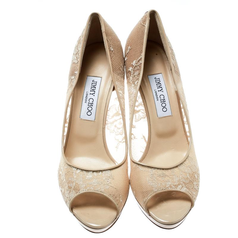 Lovely in beige, these Luna pumps from Jimmy Choo are here to make you fall in love with them! They have been crafted from lace, mesh and patent leather trims and styled with peep-toes. They come equipped with comfortable leather lined insoles, thin