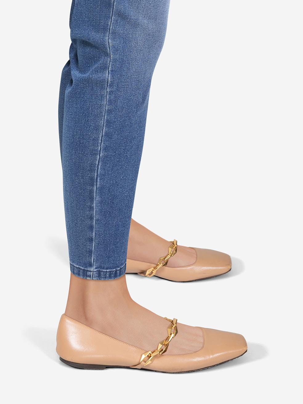 CONDITION is Good. General wear to the shoes is evident. Moderate abrasion and marks to all areas of both shoes on this used Jimmy Choo designer resale item.
 
 
 
 Details
 
 
 Model: Diamond Tilda Flat
 
 Beige
 
 Nappa leather
 
 Flats
 
 Square