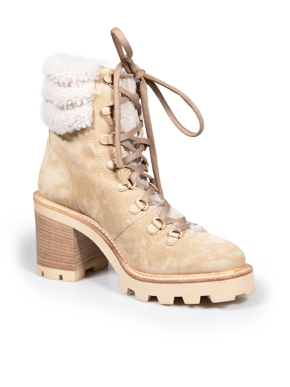 CONDITION is Very good. Minimal wear to boots is evident. Minimal scratches and discolouration on the back of the left shoe on this used Jimmy Choo designer resale item.
 
 
 
 Details
 
 
 Beige
 
 Suede
 
 Boots
 
 Mid calf
 
 Shearling lining
 
