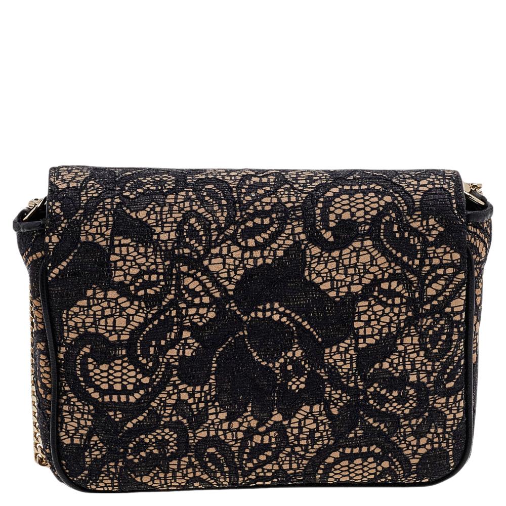 On some days, all one needs is a striking bag to create a winning look, like this creation from Jimmy Choo. It has a modern design with an exterior covered in lace and suede, and a flap revealing enough space to carry the things you cannot do