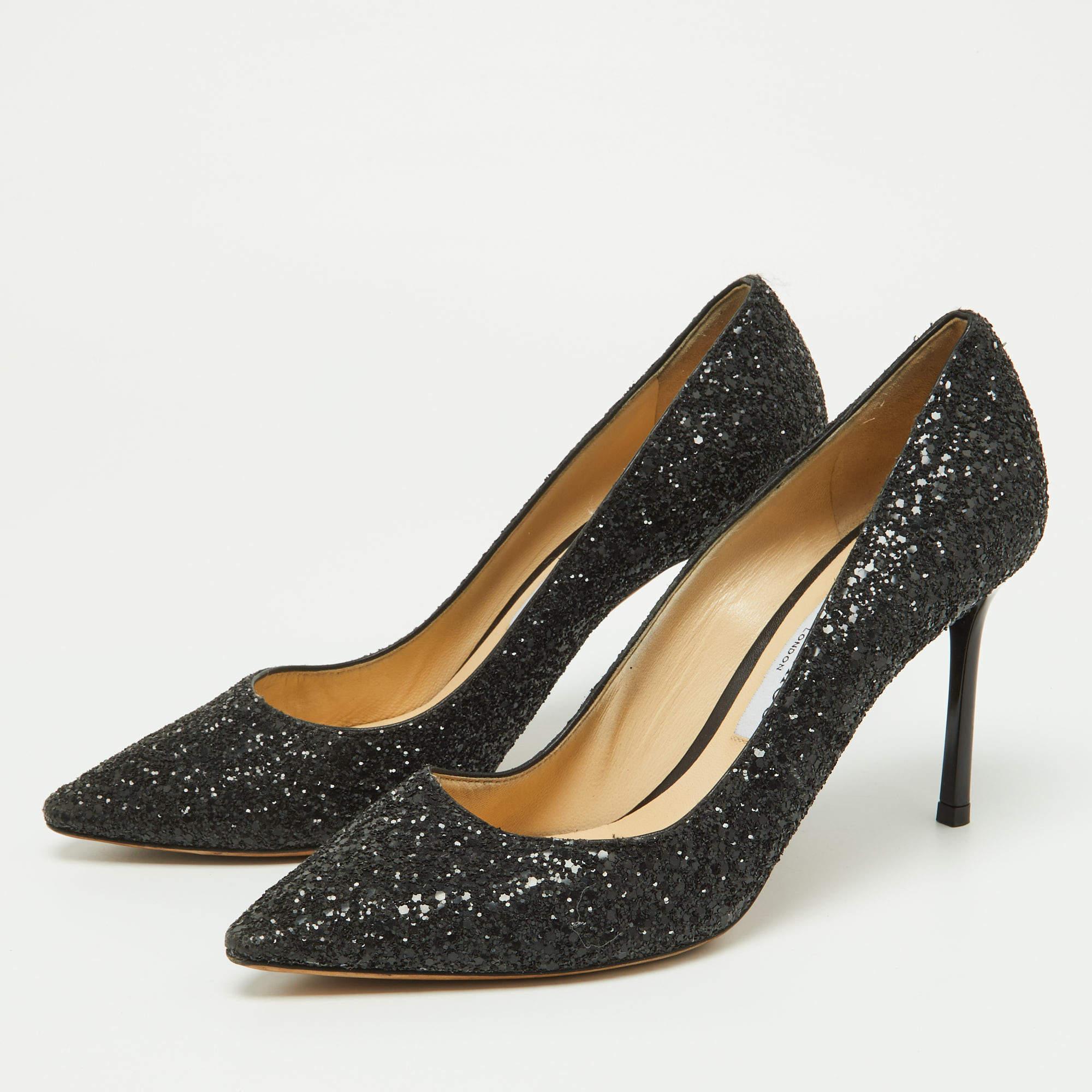 Covered in coarse glitter we love these Jimmy Choo pumps. Designed to make a statement they have a sleek silhouette and a nice fit. Wear yours under maxi skirts for a peek of glamour or let them shine with cropped hemlines.