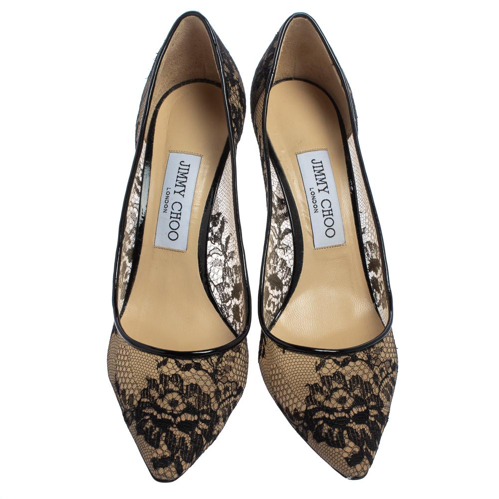Jimmy Choo brings to you these lovely pumps to upgrade any ensemble with elegance. These black pumps are crafted from coarse lace and patent leather into a grand silhouette. They flaunt pointed toes, 9 cm stiletto heels, and comfortable
