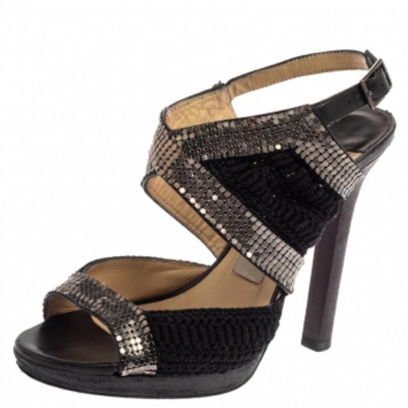 Upgrade any look by adding these Jimmy Choo sandals to your wardrobe. They are crafted from crochet fabric and designed with embellishments, open toes, slingback closure, platforms, and 12 high heels. High style and comfort will come to you when you