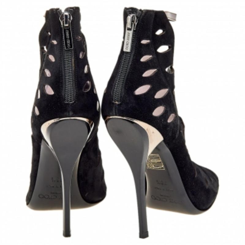 Bring Jimmy Choo's elegance and chic-feminine aesthetics to your style with these gorgeous booties. They are made from black-grey suede and leather on the exterior and exhibit peep-toes, a cut-out upper, and zipped counters. To add elevation, they