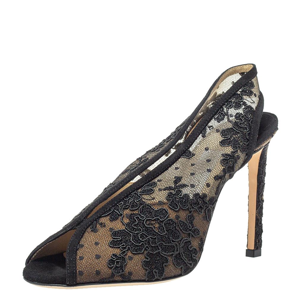 Your shoe closet is missing this pair of sandals from Jimmy Choo. Covered in lace and suede, the sandals bring a charming design and an elegant allure. They feature peep toes, slingbacks, and 9.5 cm heels. Feel stylish in this leather-lined pair.


