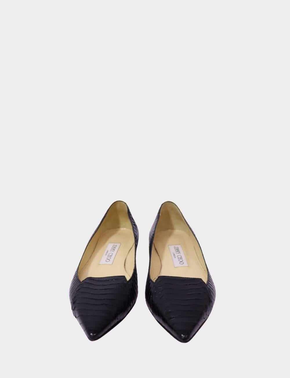Sleek, polished, and unmistakably refined—these Jimmy Choo black pointed toe flats are the perfect blend of everyday sophistication and designer luxury. Crafted in croc-embossed leather, the sharp silhouette and elegant texture elevate any look,
