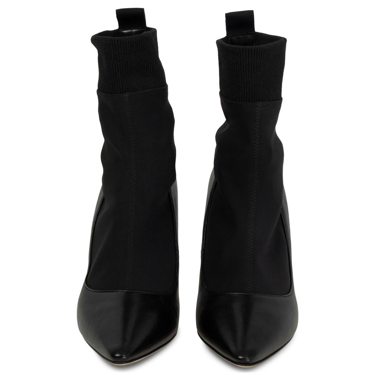 100% authentic Jimmy Choo Brandon 85 Ankle Sock Boots in black nappa leather and neoprene stretch fabric. They come with a pointed-toe and stretch rib fabric around the ankle. 'I want Choo' is printed on a grosgrain band above the heel. Brand new.