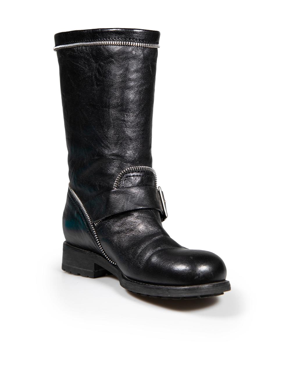 CONDITION is Very good. Minimal wear to boots is evident. Minimal wear to both boot toes with light abrasions to the leather on this used Jimmy Choo designer resale item.
 
 Details
 Black
 Leather
 Boots
 Mid calf
 Round toe
 Low heel
 Buckle and