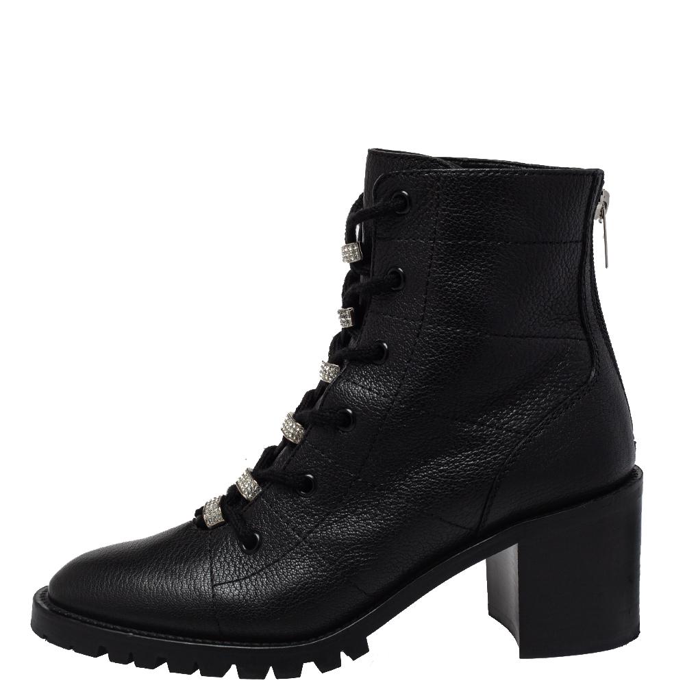 Embrace current trends and grab these combat boots by Jimmy Choo now! They have been crafted from quality leather in black and have rounded toes. In addition to block heels that give character, they have lace-ups with crystal embellishments and