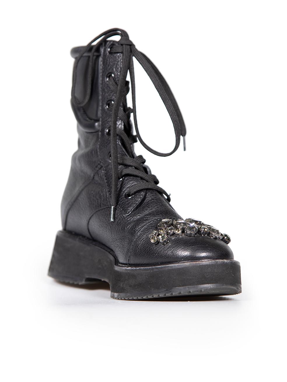 CONDITION is Very good. Minimal wear to boots is evident. Minimal peeling to finishing and small scratch on inner side of right shoe this used Jimmy Choo designer resale item.
 
 
 
 Details
 
 
 Black
 
 Leather
 
 Biker boots
 
 Flatform
 
 Round