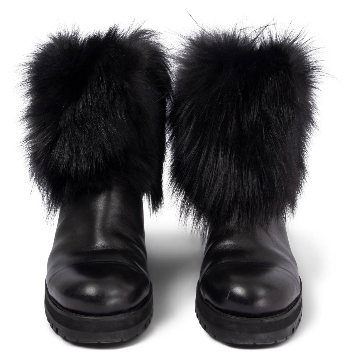 100% authentic Jimmy Choo Dana ankle-boots in black smooth calfskin with black fur trim and white rabbit fur lining. Set on a chunky rubber sole. Have been worn and are in excellent condition. 

Measurements
Imprinted Size	38
Shoe Size	38
Inside