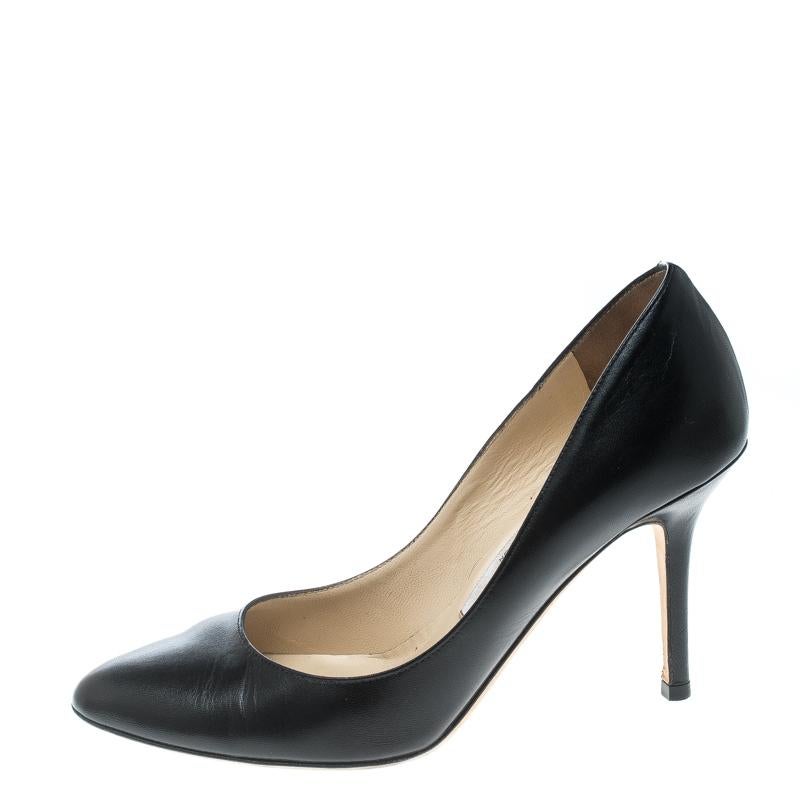 These Jimmy Choo Gilbert pumps are a wardrobe staple. They are designed with leather and set on sleek heels. This pair is finished with labelled insoles and an almond-shaped toes.

Includes: Branded Box

