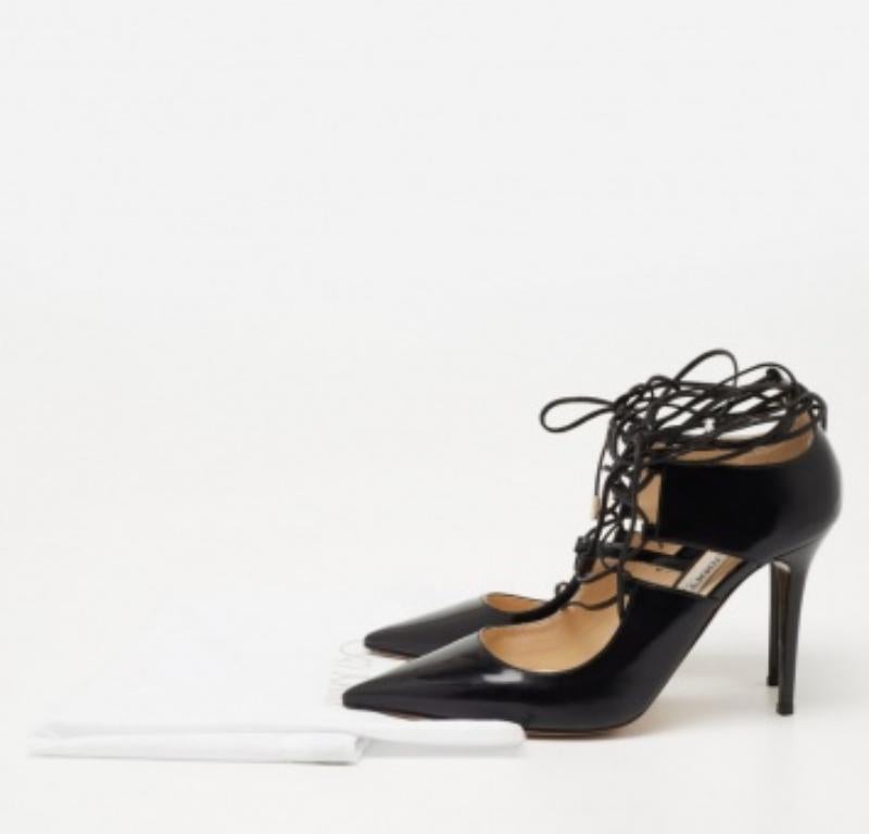 A perfect mix of elegant fashion and sensuous style, these Jimmy Choo pumps come crafted from leather and detailed with pointed toes and lace-ups that end as ties around the ankles. They're visually stunning, and they stand on tall heels.