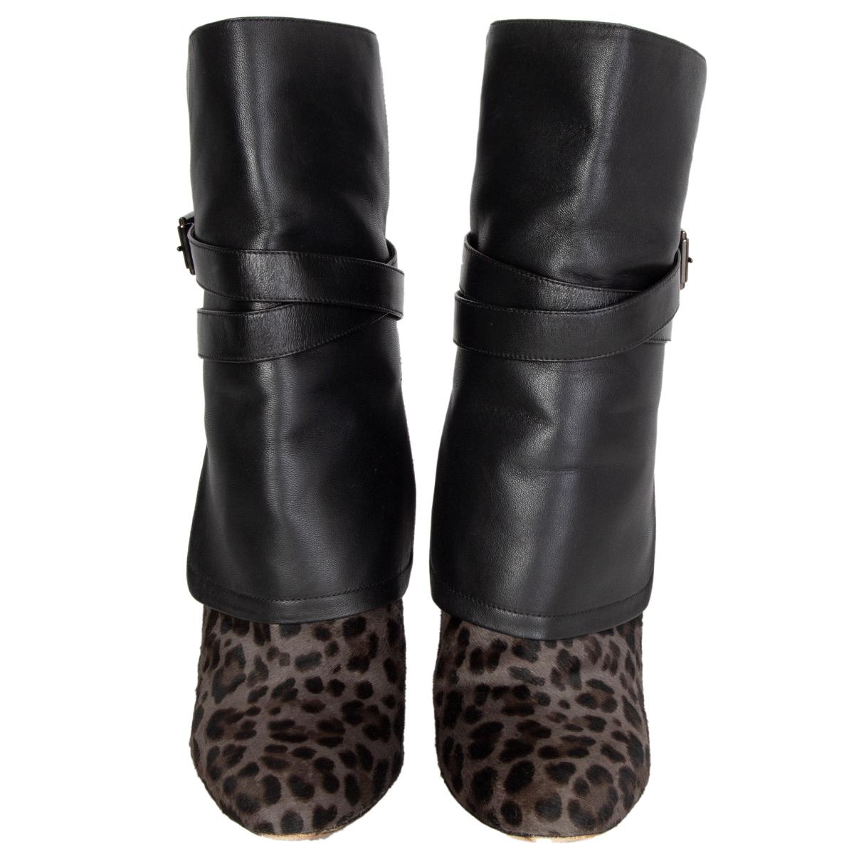100% authentic Jimmy Choo 'Blaine' boots in black calfskin with leopard print claf hair featuring buckle closure on the side. Have been worn and are in excellent. 

Measurements
Imprinted Size	40
Shoe Size	40
Inside Sole	27cm (10.5in)
Width	7.5cm