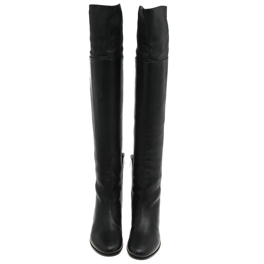 Jimmy Choo never fails to design fashion-forward styles that become favorites in one's closet. These black over-the-knee boots for women are a fine example. Made from leather, they feature round toes, fine stitching, and low heels.

Includes:
