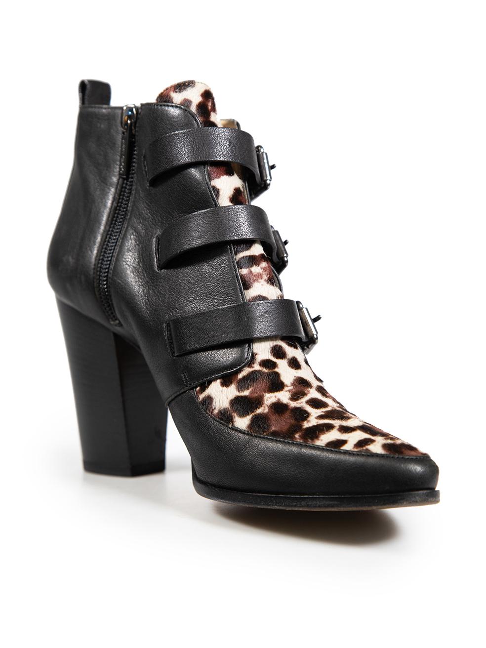 CONDITION is Very good. Minimal wear to the heels is evident. Abrasion to the left buckle strap, toe box, counter and heel on both shoes on this used Jimmy Choo designer resale item.
 
 
 
 Details
 
 
 Black
 
 Leather
 
 Ankle boots
 
 Almond toe
