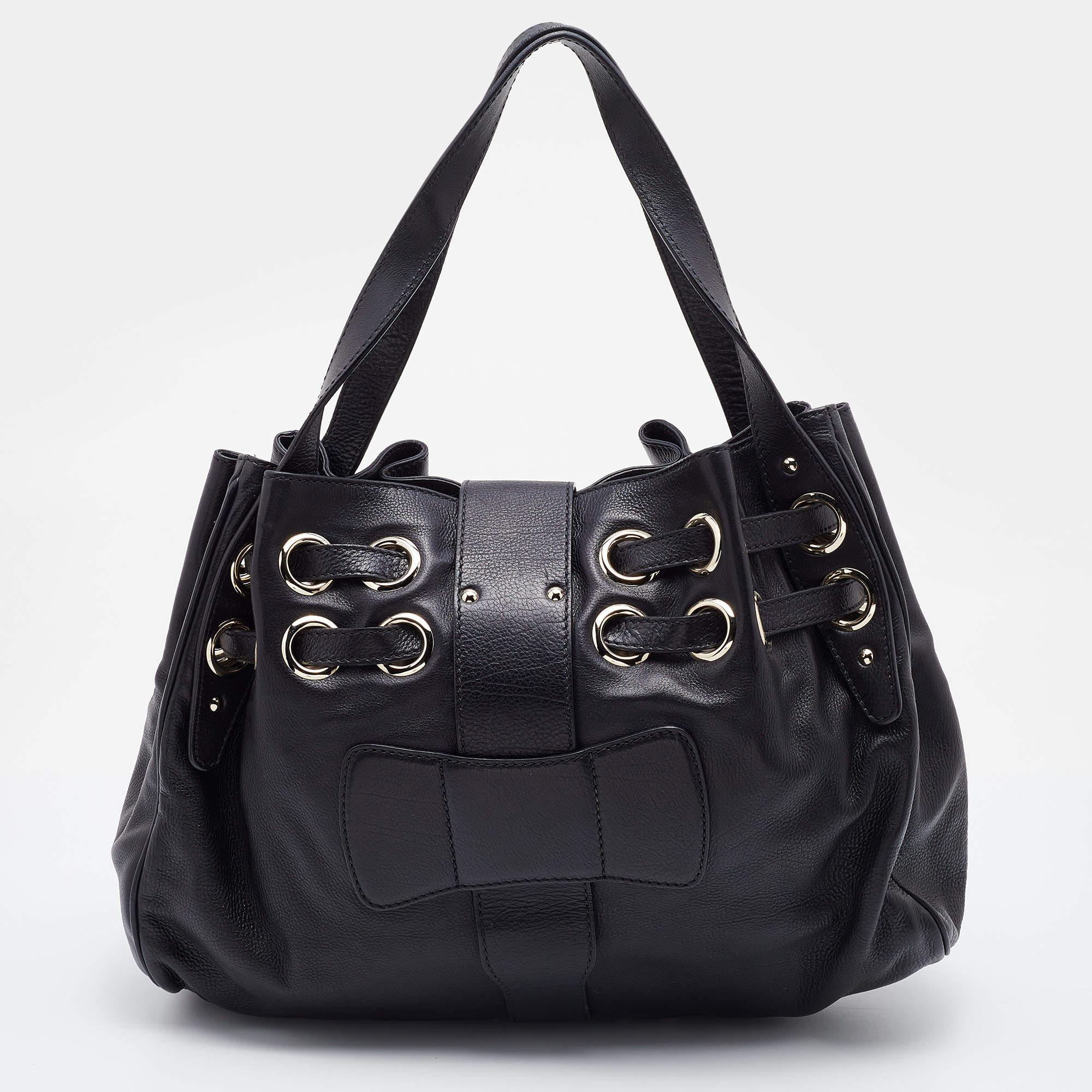 For a look that is complete with style, taste, and a touch of luxe, this designer bag is the perfect addition. Flaunt this beauty on your shoulder and revel in the taste of luxury it leaves you with.

Includes: Original Dustbag

